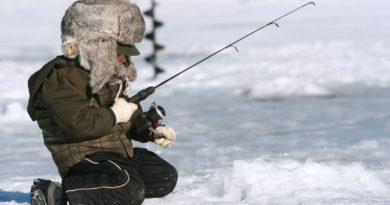 Kid Ice Fishing In New York